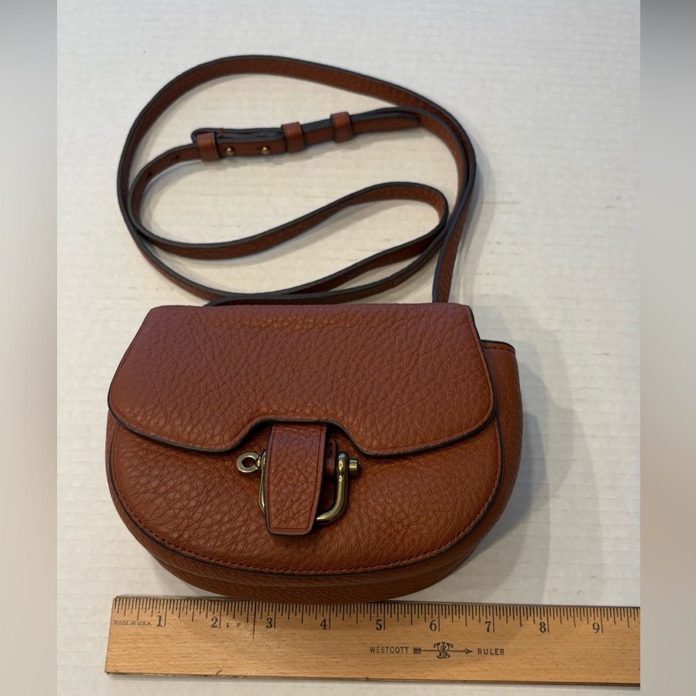J. Crew Elegant brown leather mini rider crossbody bag.